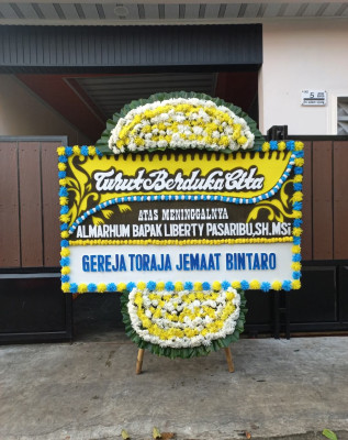 Papan Bunga Duka di Jetsy
