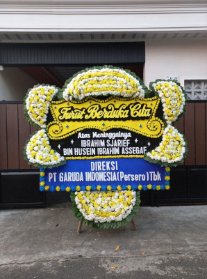 Papan Bunga Duka di Jetsy