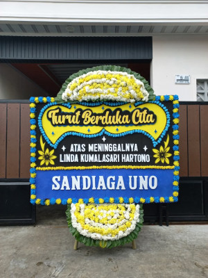 Papan Bunga Duka di Jetsy